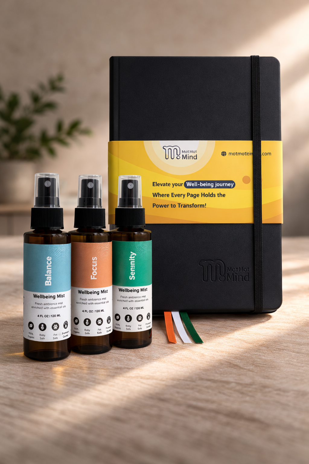 Black notebook with yellow label and three small bottles on a wooden surface.